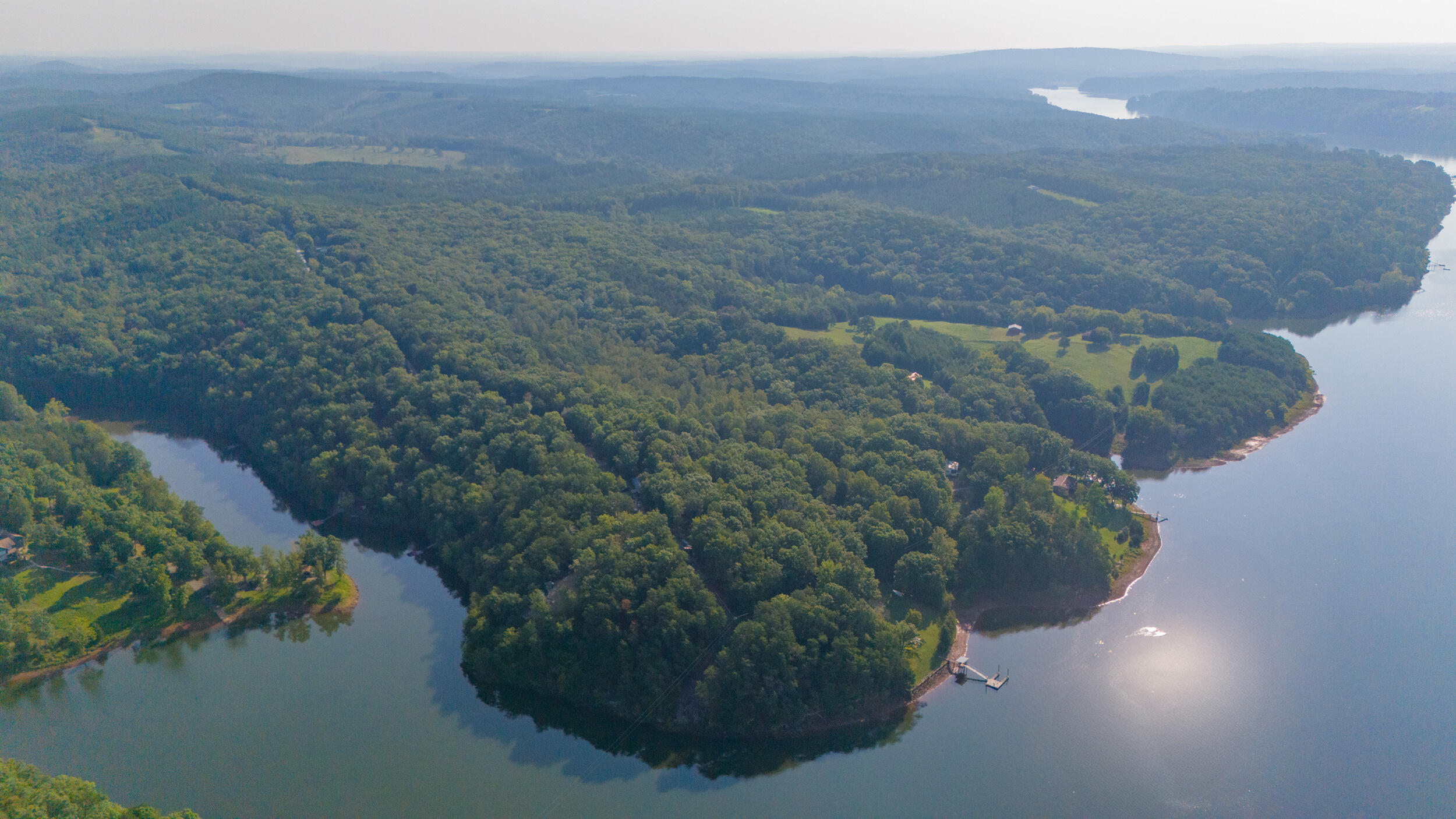 5 Trellis Ridge Drive Lynch Station, VA 24571 - Photo 3 of 14 a view of a lake from a yard