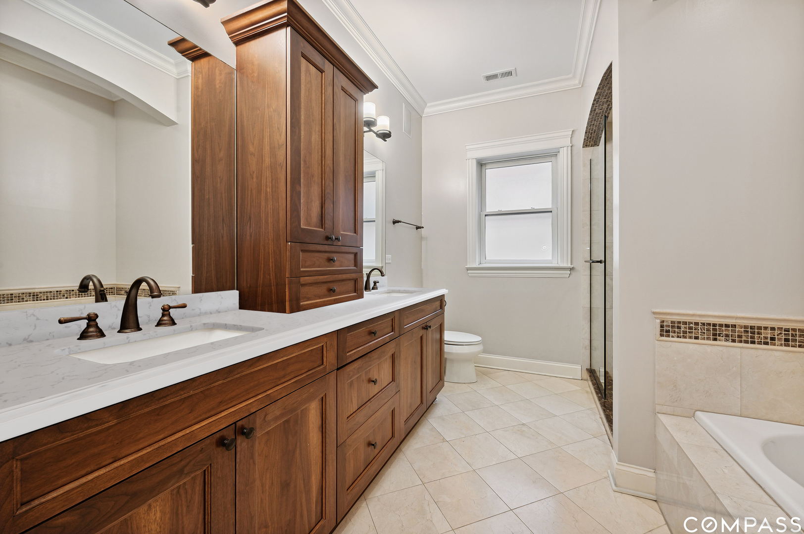 106 South Sangamon Street, Unit 3S Chicago, IL 60607 - Photo 14 of 20 a bathroom with a double vanity sink a and mirror