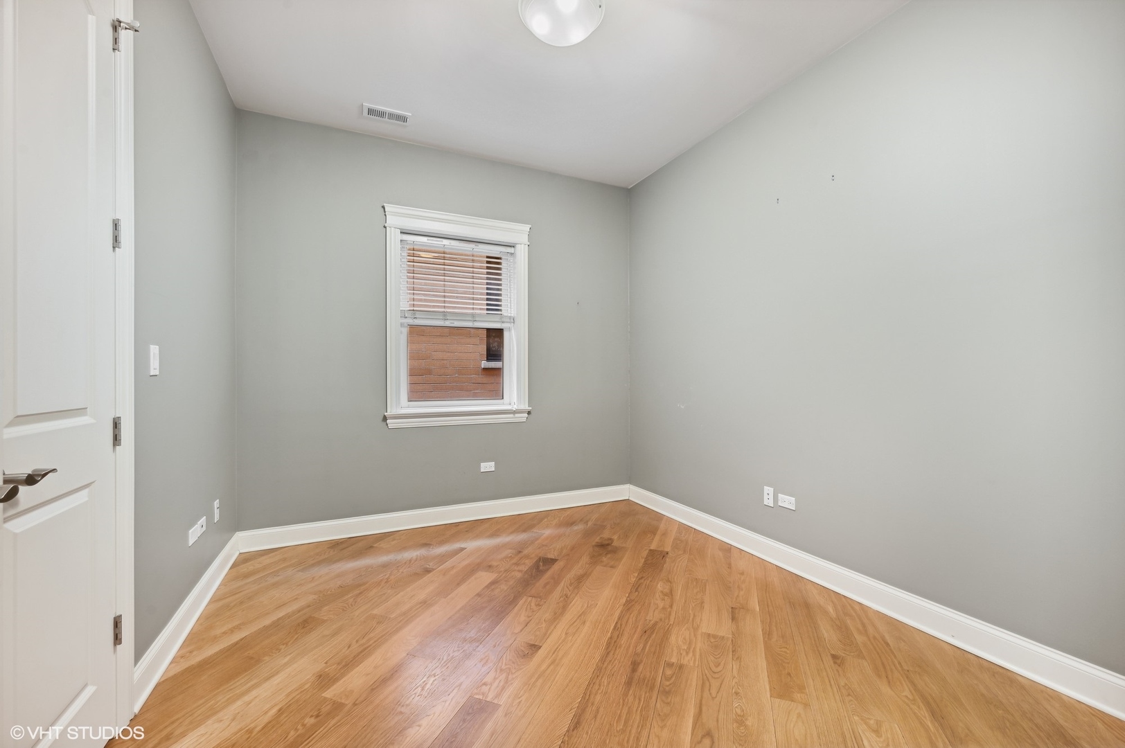 106 South Sangamon Street, Unit 3S Chicago, IL 60607 - Photo 16 of 20 a view of a room with wooden floor and a window