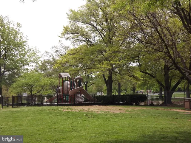 a view of balcony with furniture and trees
