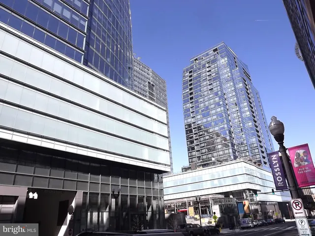 a view of a building with a street
