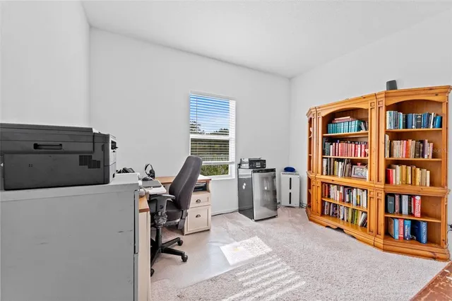 a workspace with a bookshelf