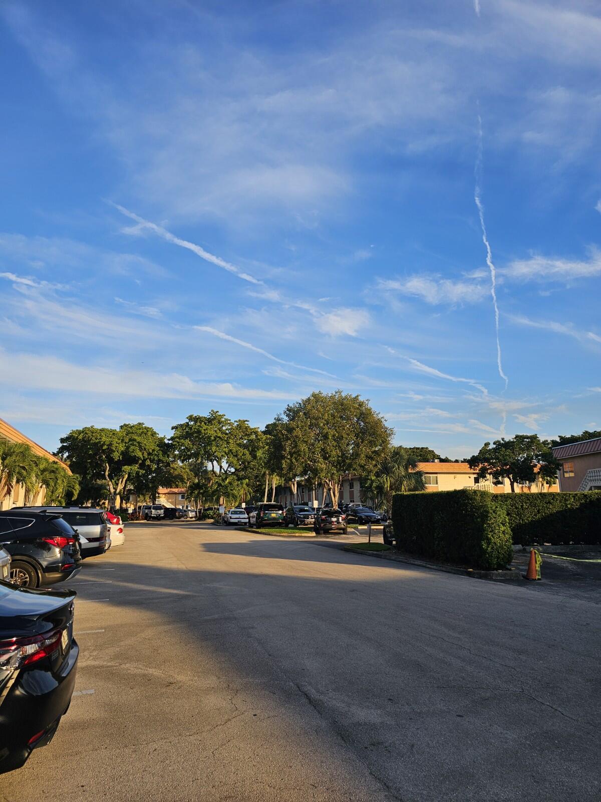 119 Northeast 19th Court, Unit 211G Wilton Manors, FL 33305 - Photo 21 of 21 a view of street with cars