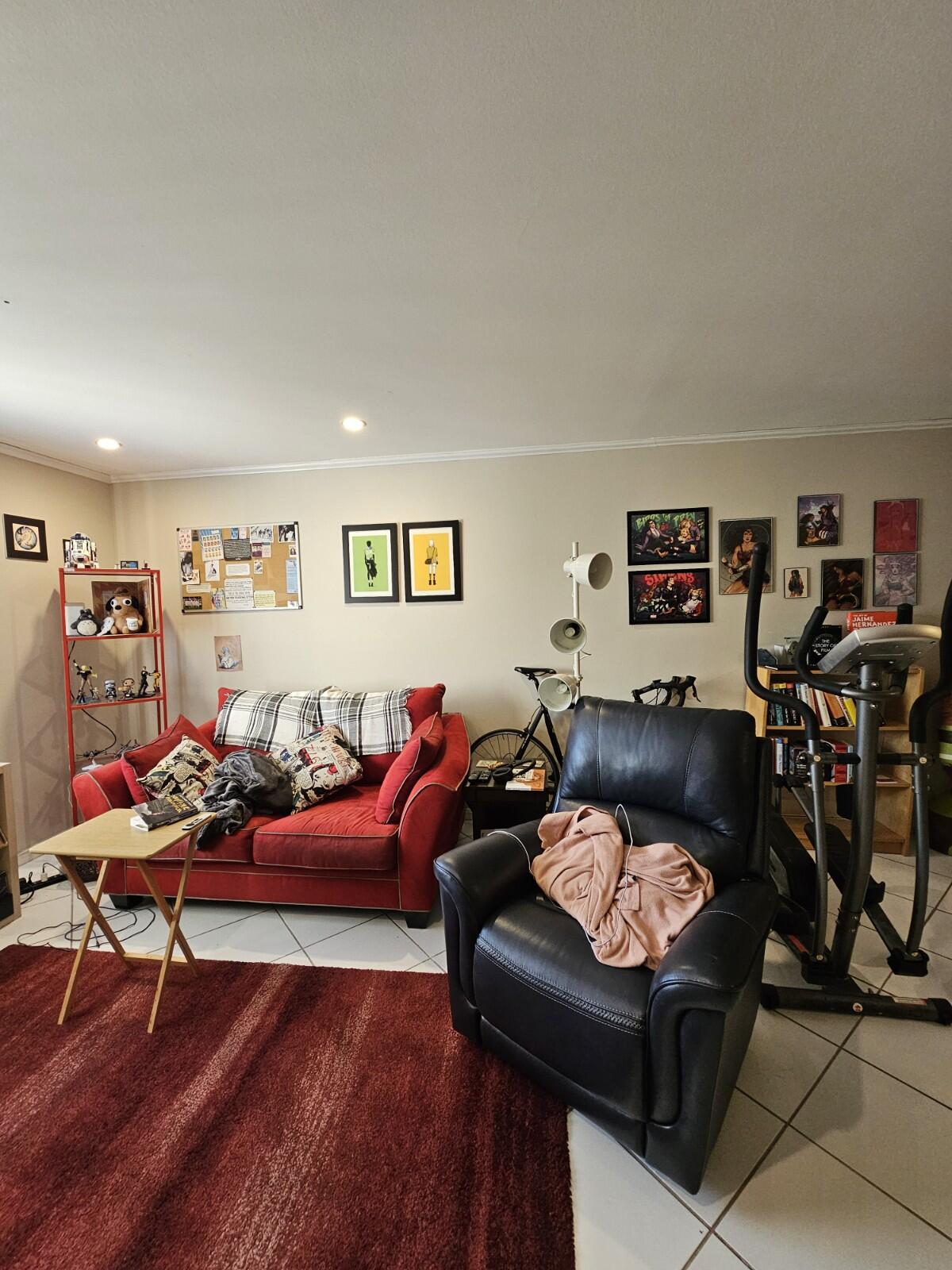 119 Northeast 19th Court, Unit 211G Wilton Manors, FL 33305 - Photo 6 of 21 a living room with furniture and wooden floor