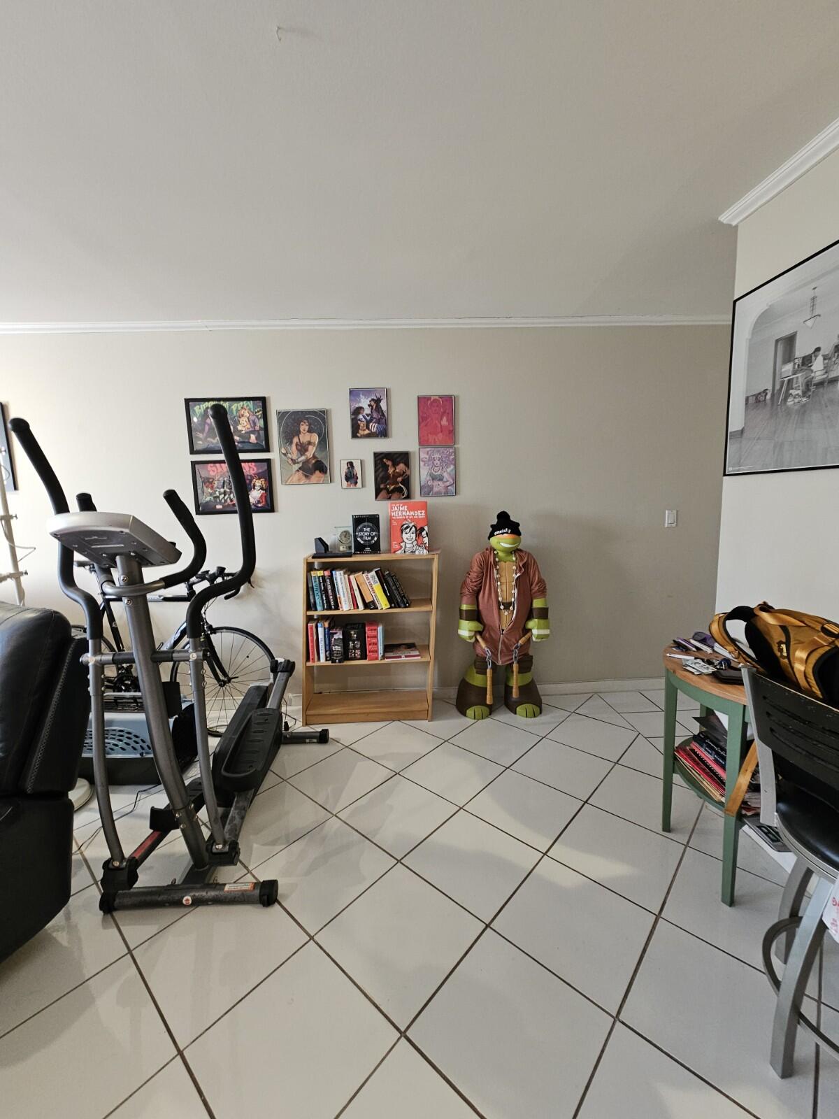 119 Northeast 19th Court, Unit 211G Wilton Manors, FL 33305 - Photo 8 of 21 a view of a room with gym equipment