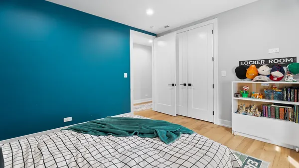 a view of empty room and wooden floor