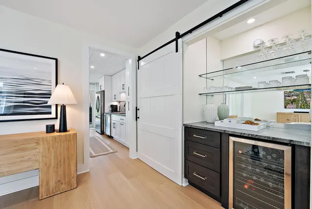a kitchen with a stove and a table