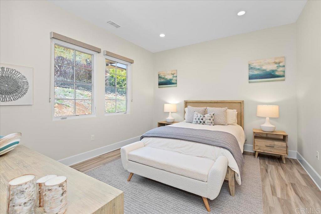 3849 Rancho Summit Drive Encinitas, CA 92024 - Photo 43 of 63 a bedroom with a bed and a window