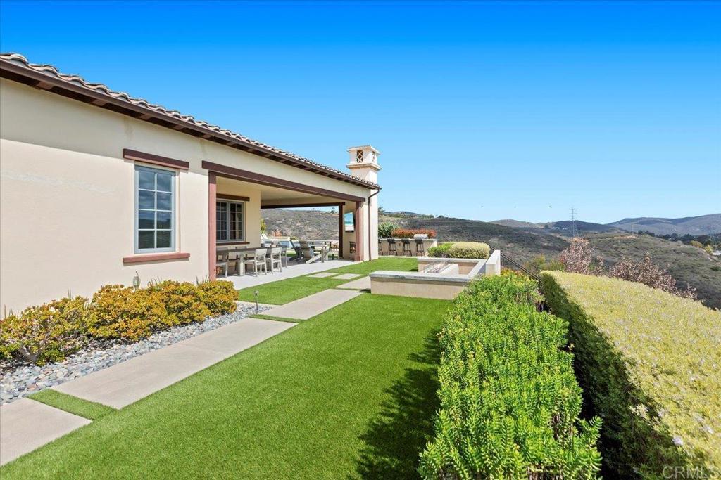 3849 Rancho Summit Drive Encinitas, CA 92024 - Photo 58 of 63 a view of house with garden