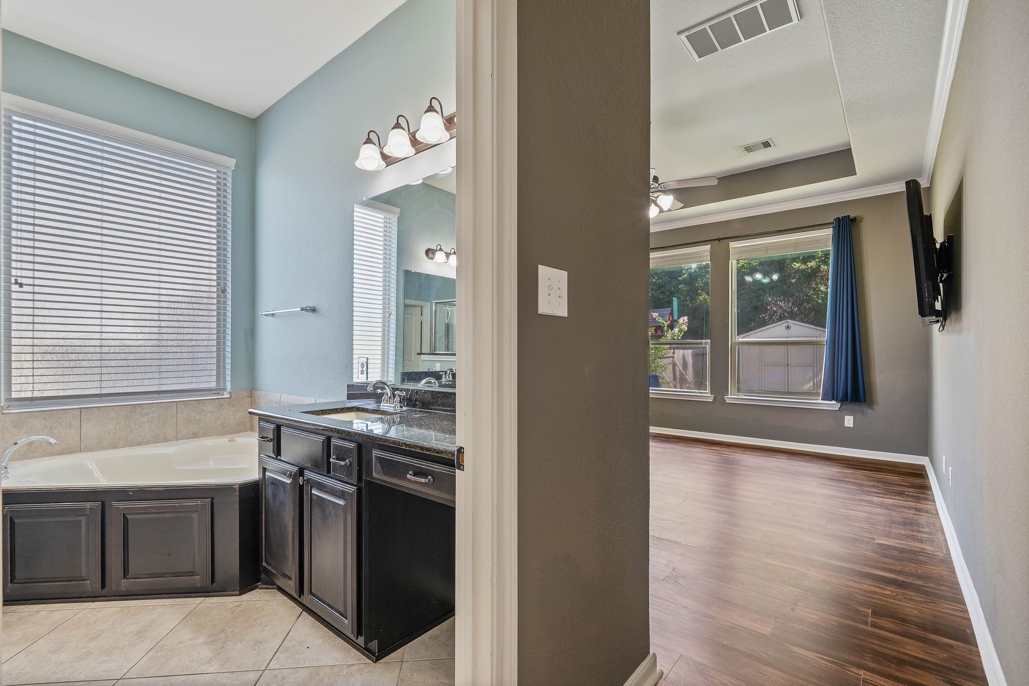 3544 Woods Estates Drive Conroe, TX 77304 - Photo 17 of 46 a kitchen with stainless steel appliances granite countertop a stove and a sink