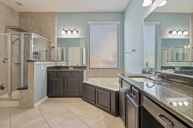 a kitchen with a sink stove and refrigerator