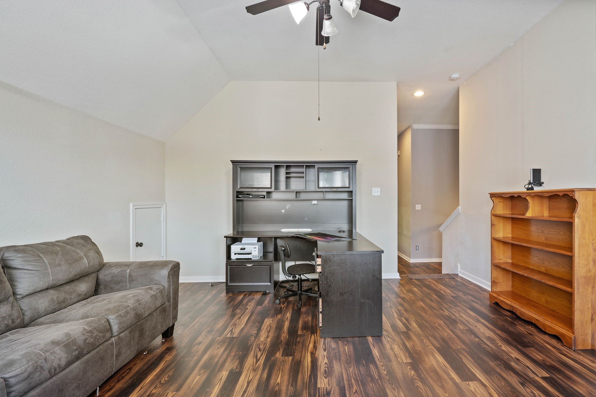 3544 Woods Estates Drive Conroe, TX 77304 - Photo 27 of 46 a living room with furniture and wooden floor