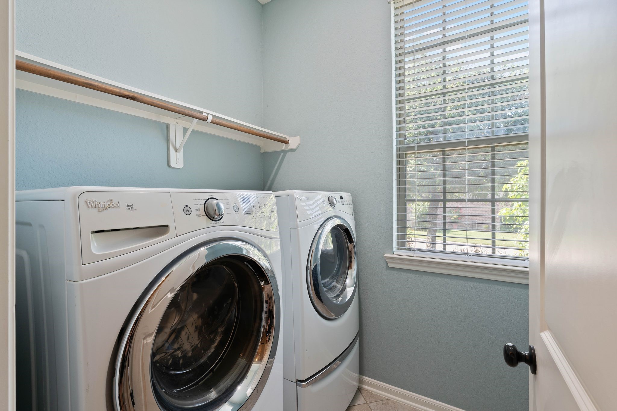 3544 Woods Estates Drive Conroe, TX 77304 - Photo 35 of 46 a utility room with dryer and washer