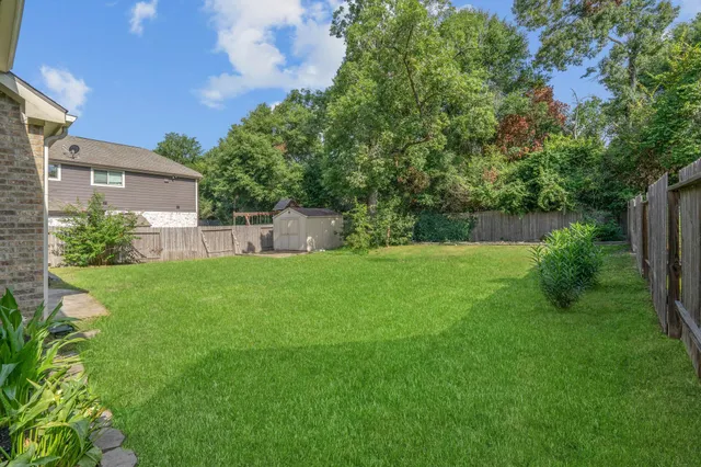a view of a backyard with a garden