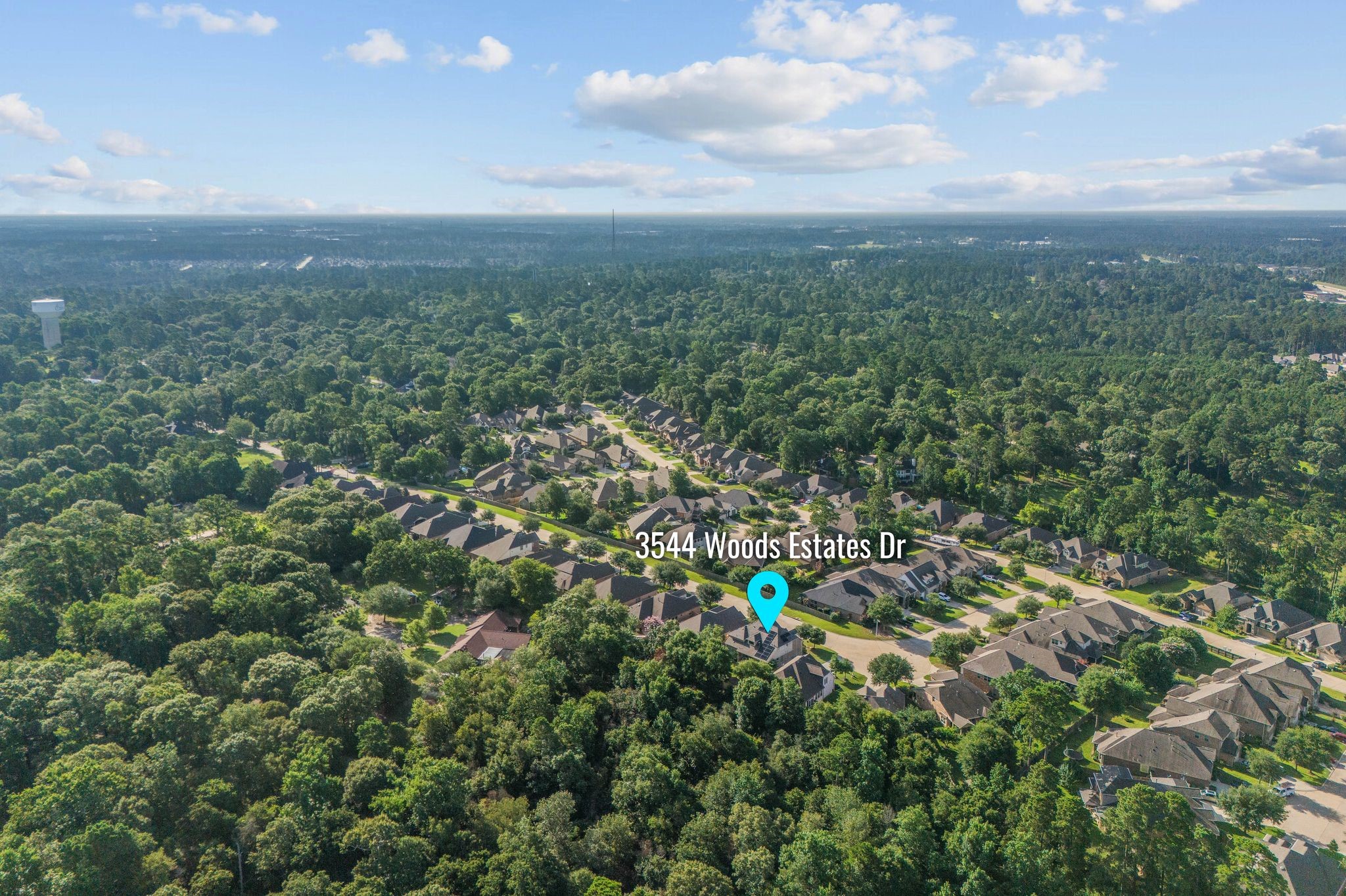 3544 Woods Estates Drive Conroe, TX 77304 - Photo 44 of 46 a view of a city