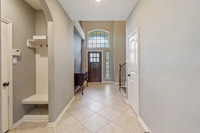 wooden floor in a gallery with a living room