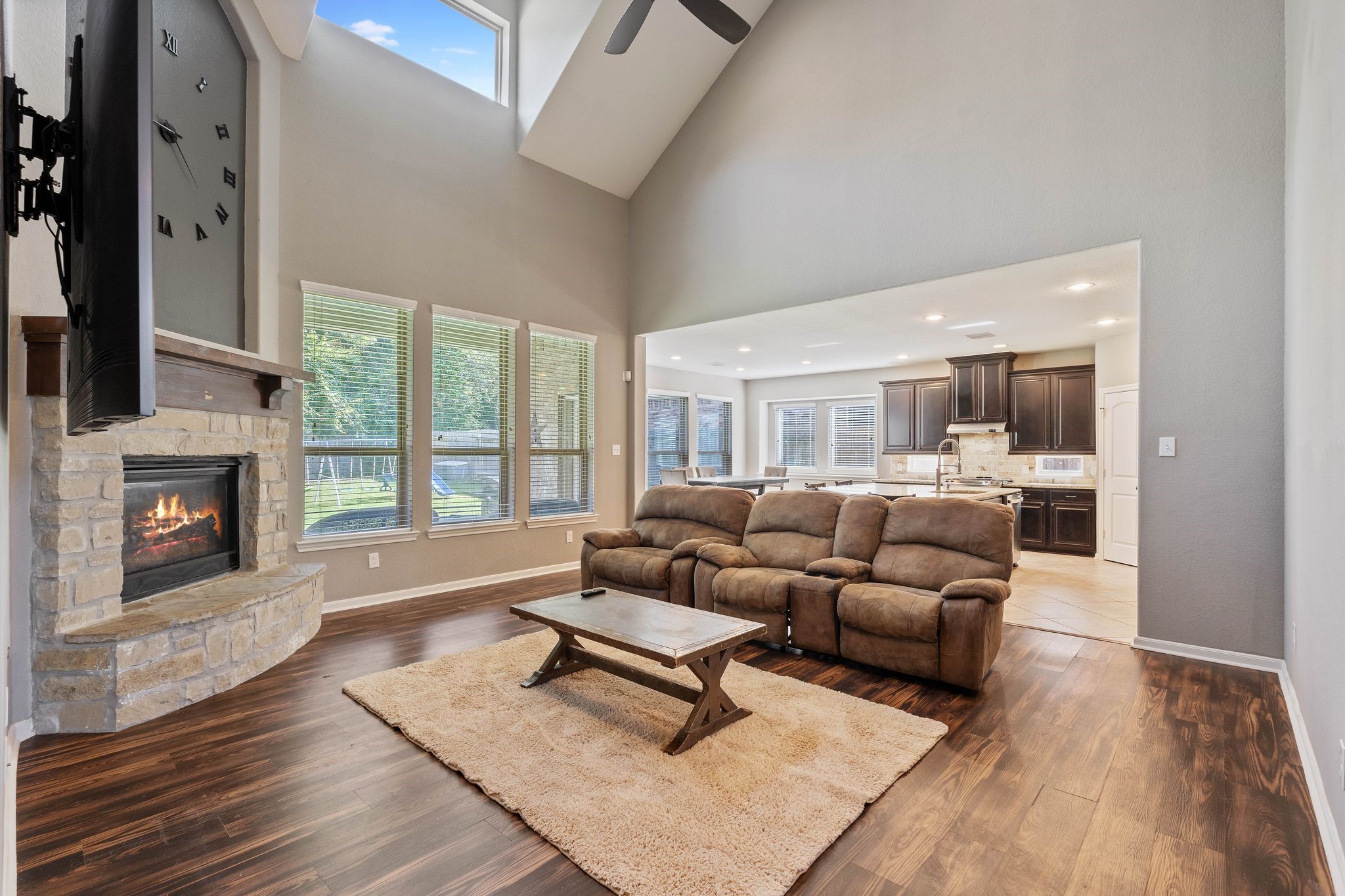 3544 Woods Estates Drive Conroe, TX 77304 - Photo 10 of 46 a living room with furniture and a fireplace
