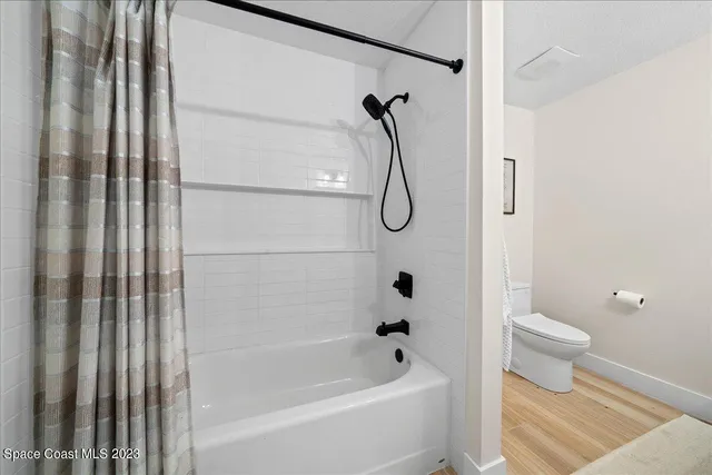 a view of a garage with a lot of stuff