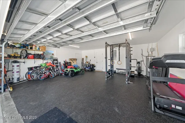 a view of swimming pool with seating space