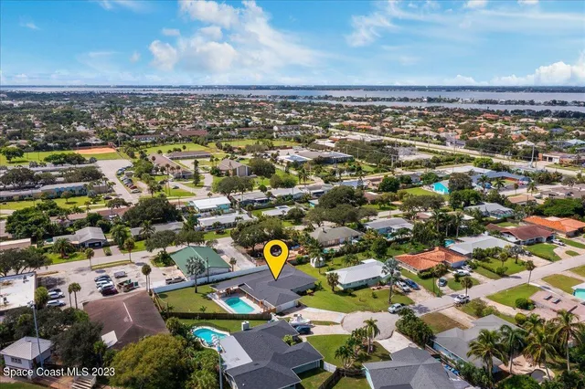 a swimming pool with yard