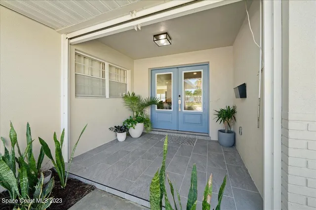a view of a dining area with furniture and wooden floor