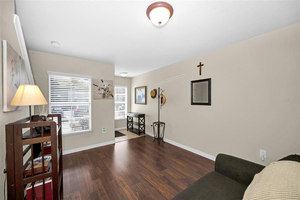 9736 Trumpet Vine Loop Trinity, FL 34655 - Photo 13 of 35 a view of a livingroom with furniture and a window