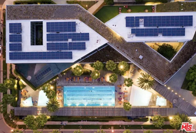 a view of building along the road and tall buildings