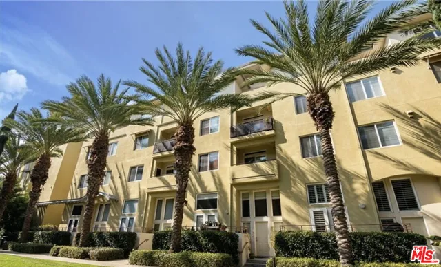 a view of a building with a street