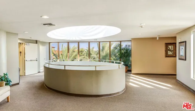 a living room with a large window