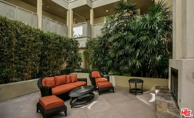 a outdoor living space with furniture and garden view