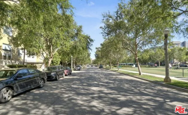 a view of a park with lots of trees