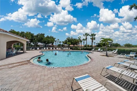 a view of outdoor space swimming pool and seating