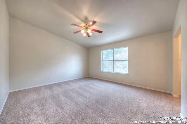 a kitchen that has a sink and a stove