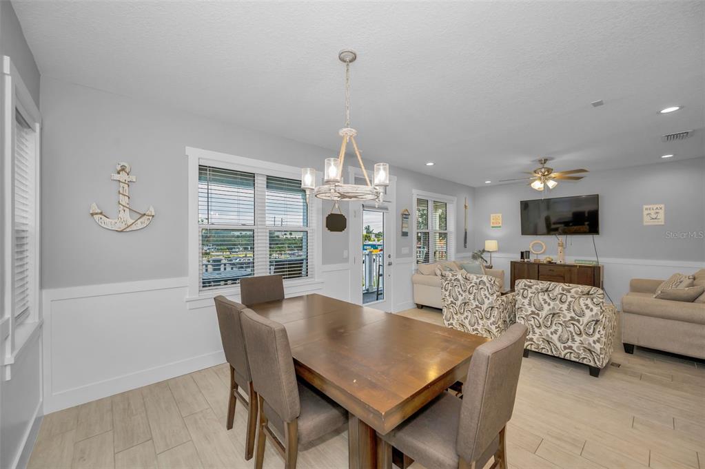 204 Gulf Boulevard Indian Rocks Beach, FL 33785 - Photo 24 of 72 a view of a dining room with furniture window and outside view