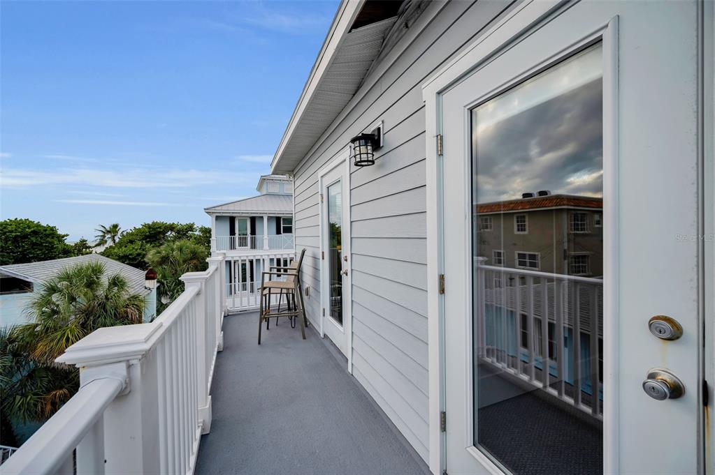 204 Gulf Boulevard Indian Rocks Beach, FL 33785 - Photo 41 of 72 a view of balcony with furniture