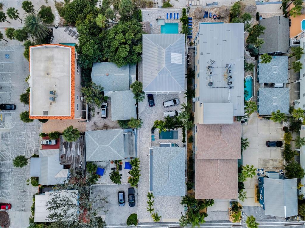 204 Gulf Boulevard Indian Rocks Beach, FL 33785 - Photo 7 of 72 an aerial view of residential houses with outdoor space