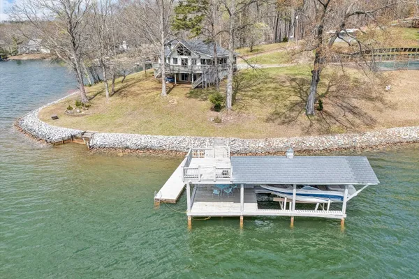 an aerial view of a house with outdoor space