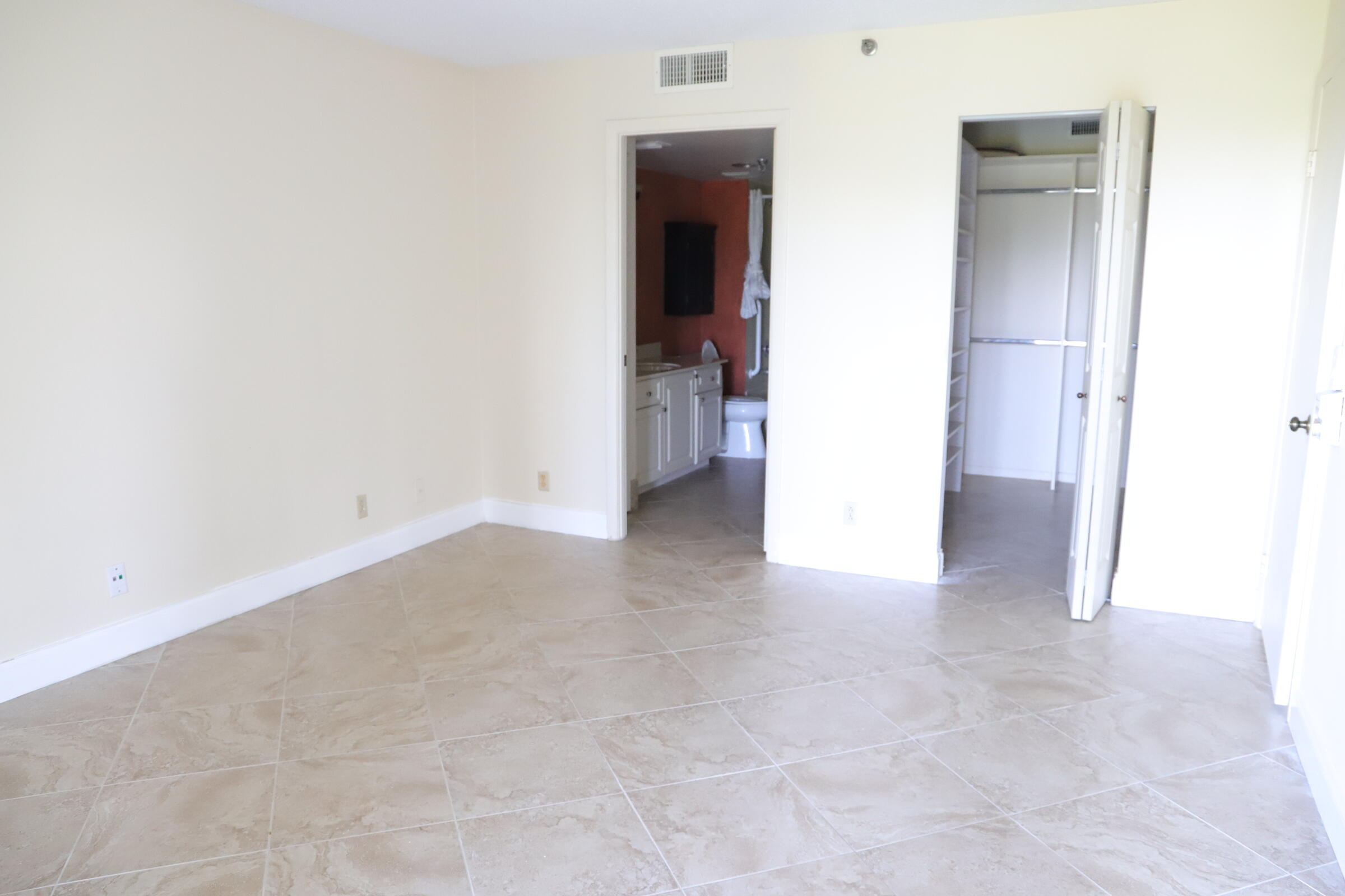 6400 Northwest 2nd Avenue, Unit 423 Boca Raton, FL 33487 - Photo 9 of 19 a view of an empty room