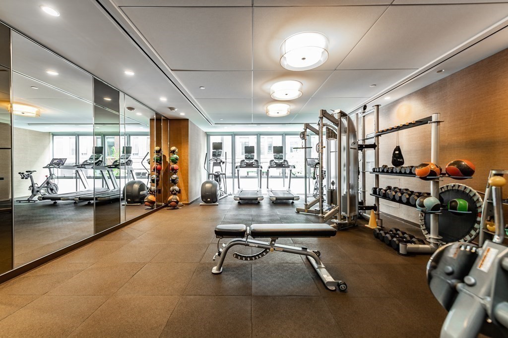 32 Traveler Street, Unit 304 Boston, MA 02118 - Photo 24 of 35 a view of a room with gym equipment