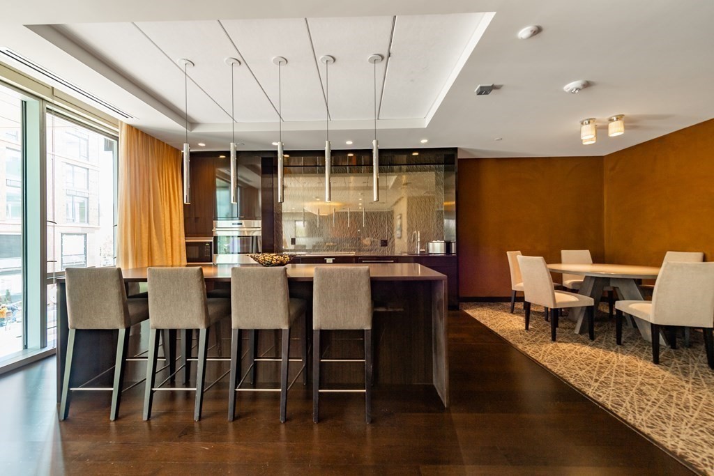 32 Traveler Street, Unit 304 Boston, MA 02118 - Photo 26 of 35 a dining room with furniture window and wooden floor