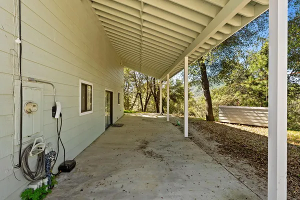 a view of a backyard of a house