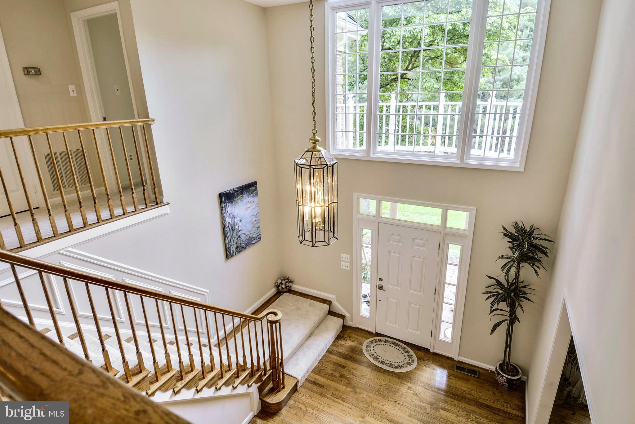 6505 Deidre Terrace McLean, VA 22101 - Photo 12 of 30 a view of entryway and hall with wooden floor