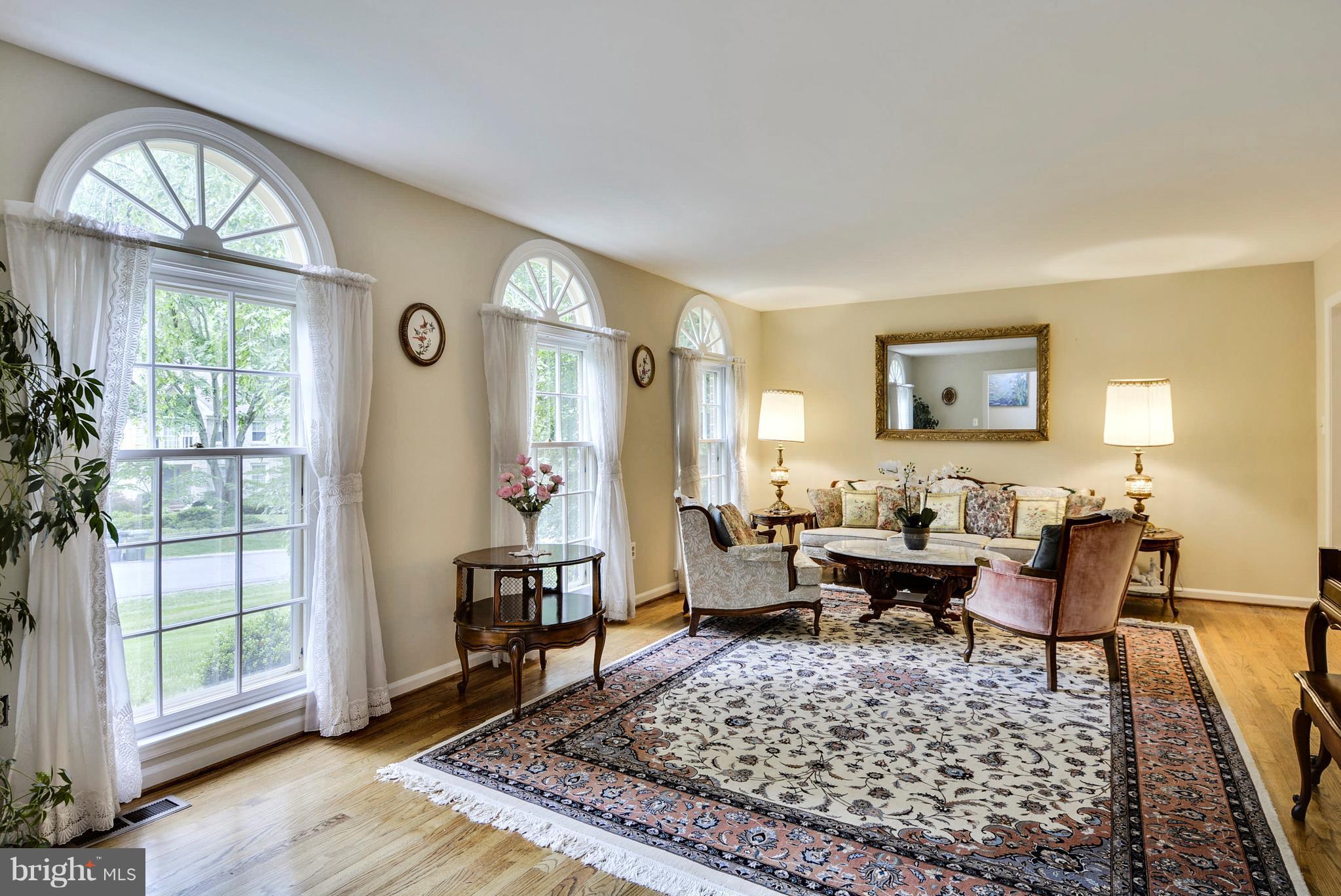 6505 Deidre Terrace McLean, VA 22101 - Photo 3 of 30 a living room with furniture couches and a table