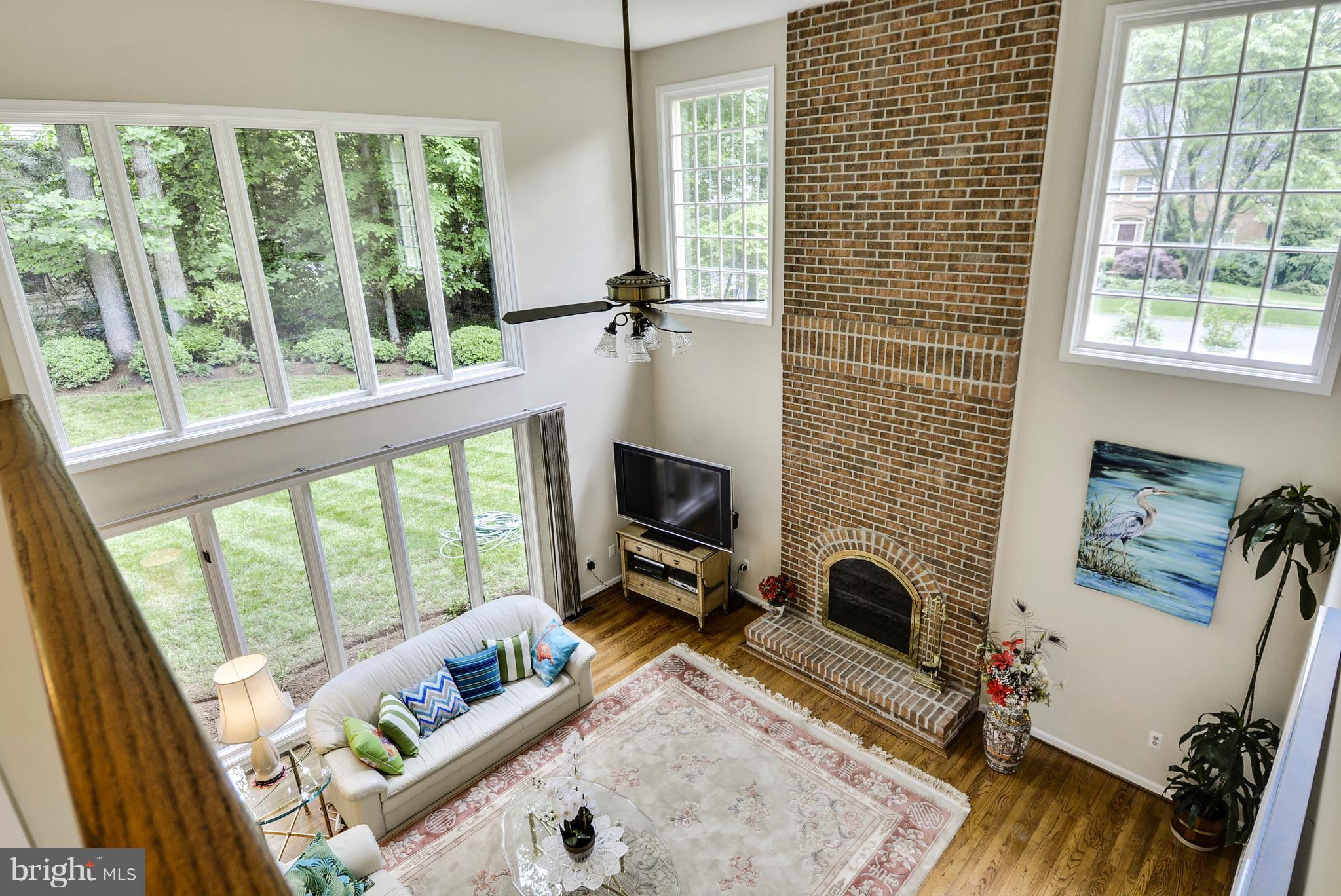 6505 Deidre Terrace McLean, VA 22101 - Photo 22 of 30 a living room with furniture and a flat screen tv