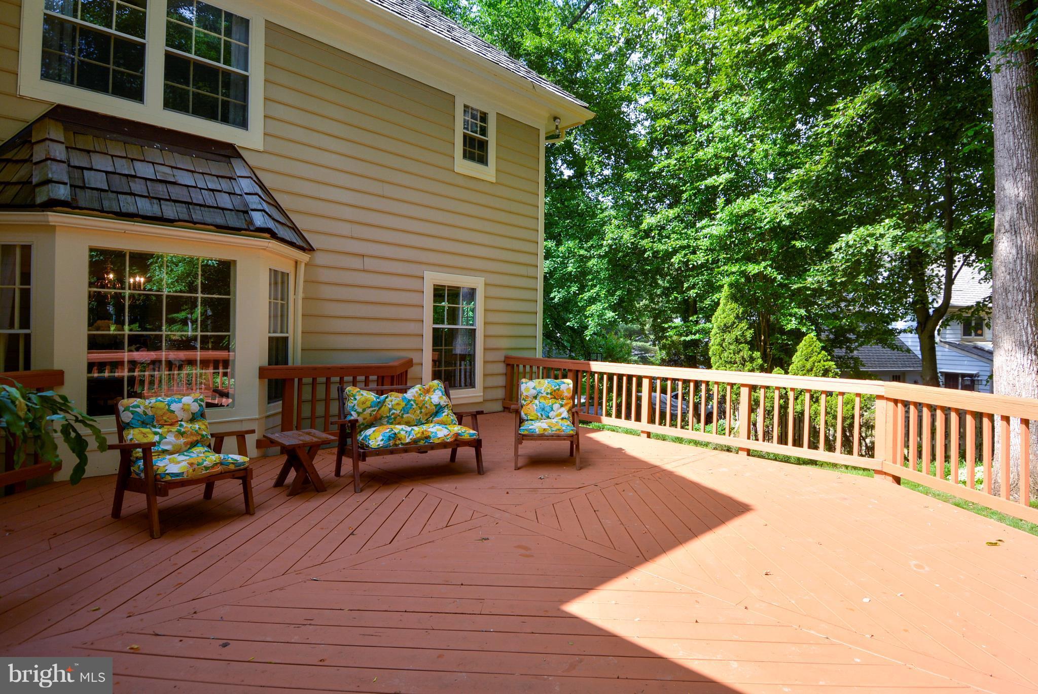 6505 Deidre Terrace McLean, VA 22101 - Photo 28 of 30 a balcony with wooden floor and furniture