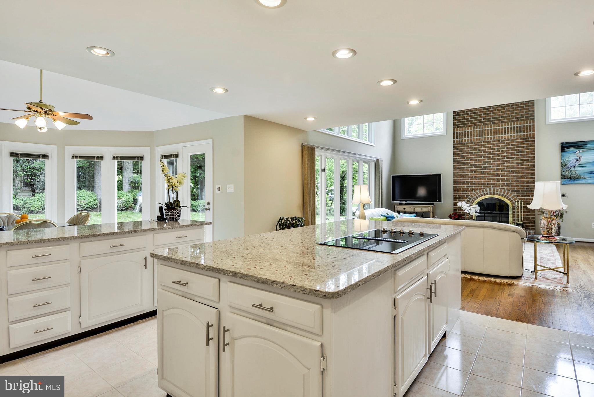6505 Deidre Terrace McLean, VA 22101 - Photo 8 of 30 a kitchen with sink stove and cabinets