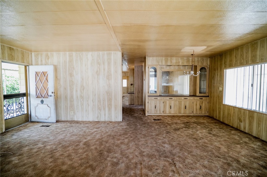 1439 Ridgemont Way Corona, CA 92882 - Photo 4 of 17 an empty room with windows