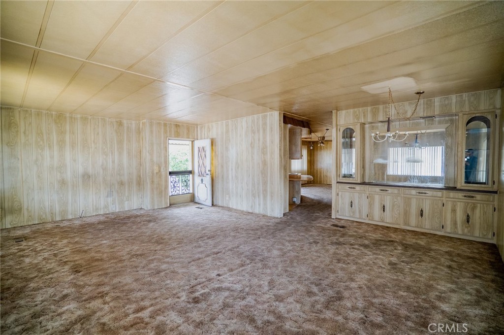 1439 Ridgemont Way Corona, CA 92882 - Photo 5 of 17 a view of empty room with wooden floor