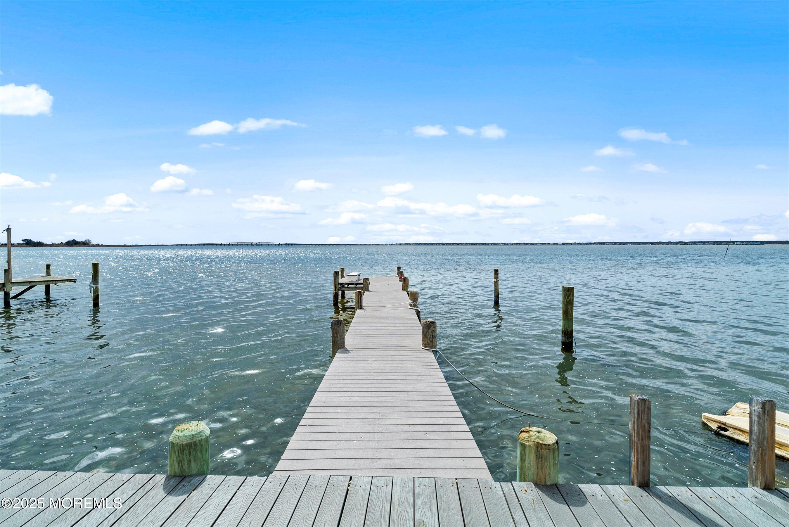 133 Pershing Boulevard Lavallette, NJ 08735 - Photo 1 of 86 a view of wooden floor with a lake