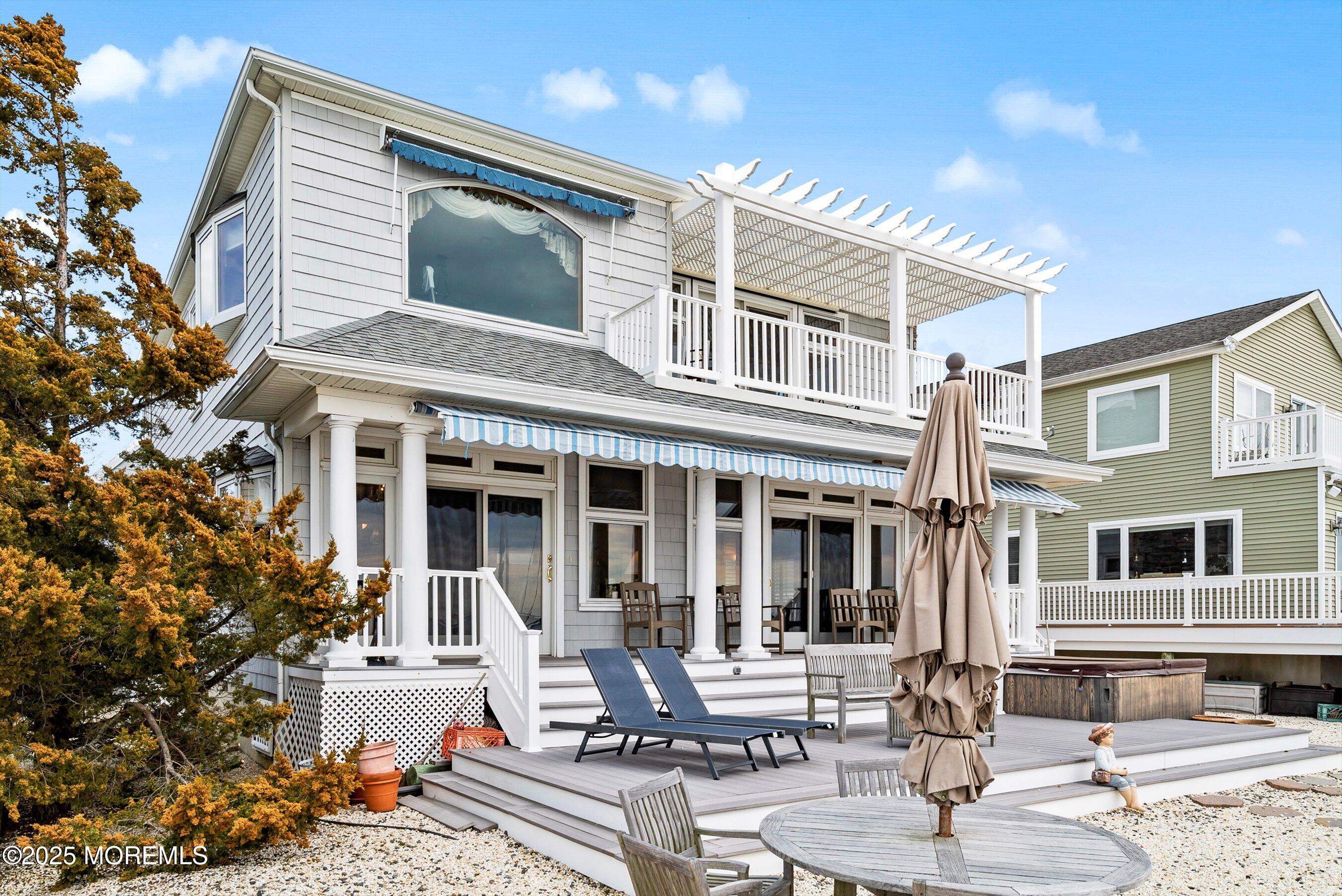 133 Pershing Boulevard Lavallette, NJ 08735 - Photo 62 of 86 a front view of a house with garden